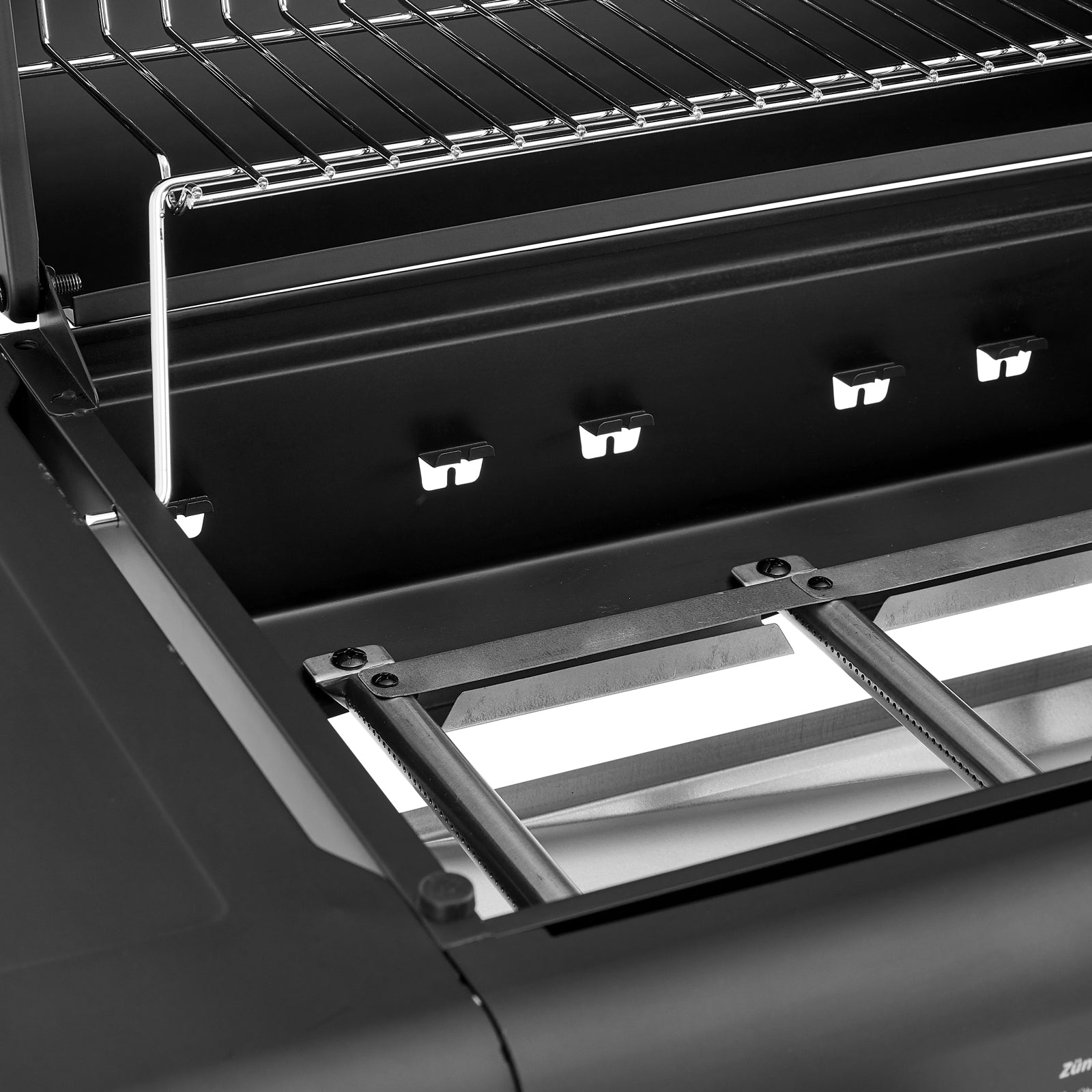 TAINO COMPACT 3+0 Gasgrill Detailansicht Garraum mit Edelstahlbrennern und Warmhalterost