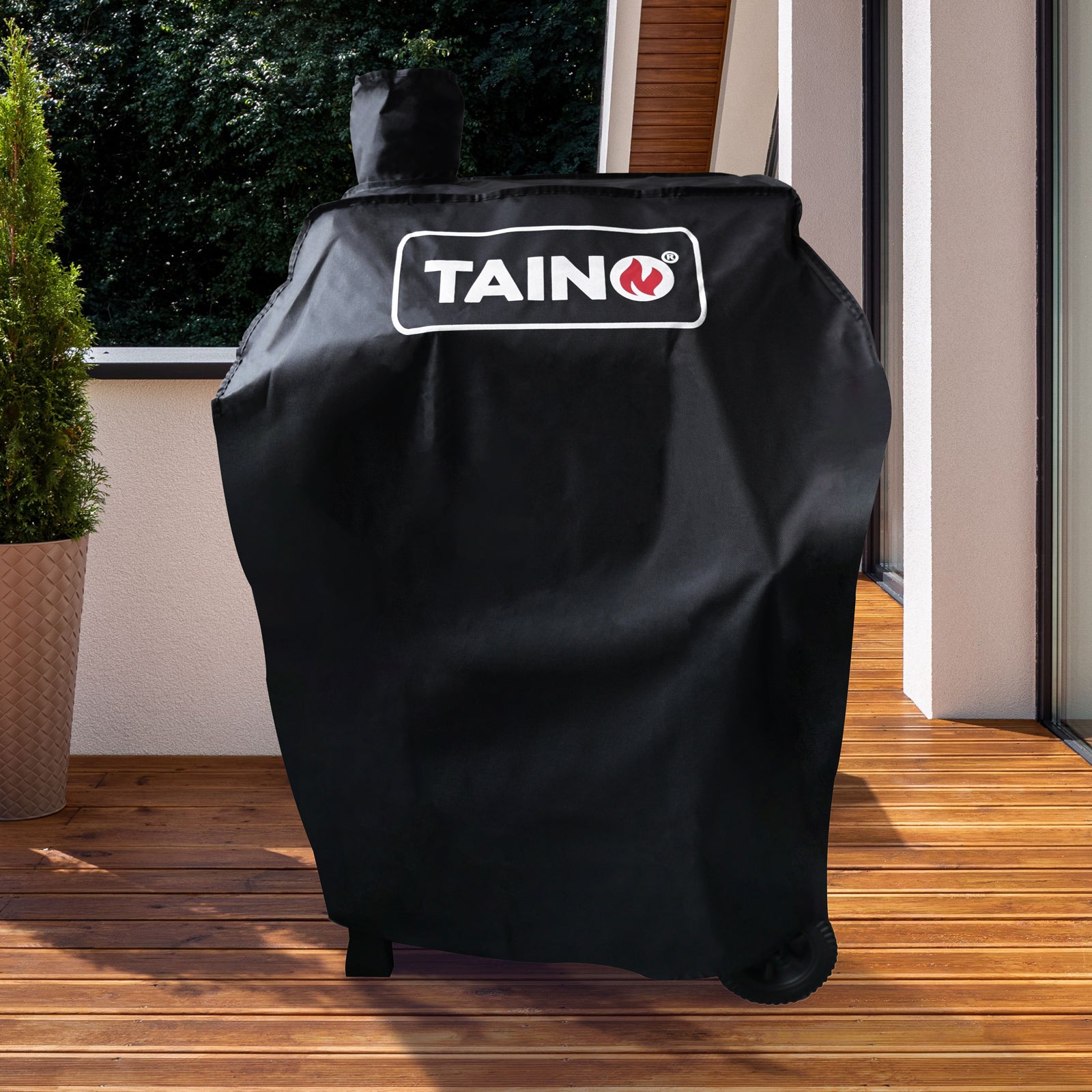 Abdeckhaube für TAINO HERO Holzkohlegrill auf Terrasse